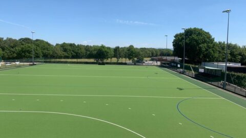 Artifical pitch with stand and floodlighting
